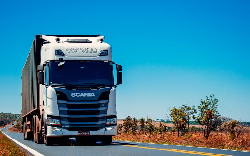 Fleet of trucks on highway